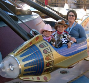 Angie, Isaiah, & Emmie on the Astro Orbitor Angie, Isaiah, & Emmie on the Astro Orbitor